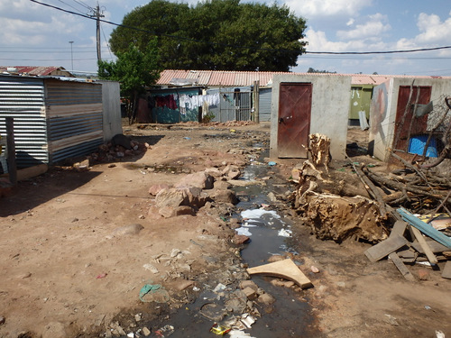 Surface water runoff by toilet.